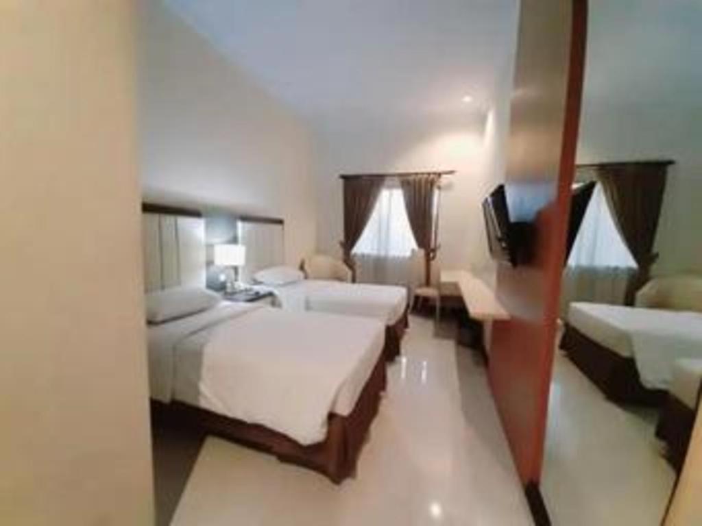 Bella Hotel Surabaya Exterior photo